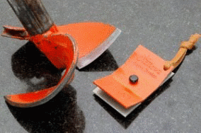 Ice auger sharpener with an auger